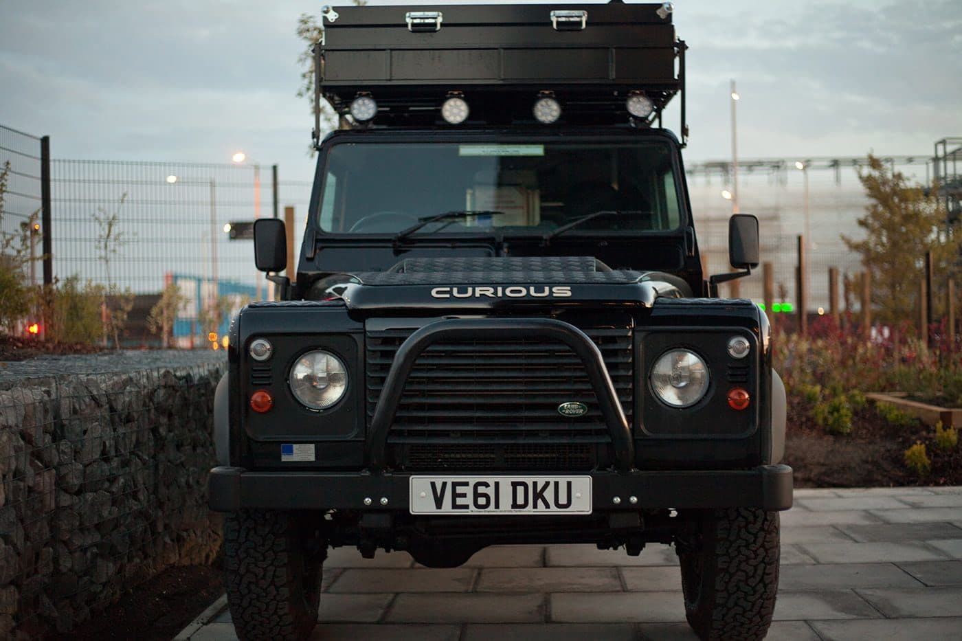 Front view of the Curious Brewing Land Rover with roof rack and spotlights